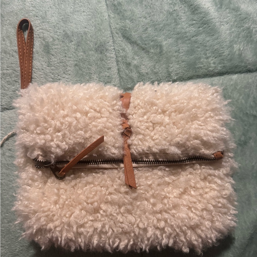 Universal Thread Cream Fuzzy Clutch with Tan Strap